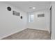 Cozy bedroom featuring natural light, neutral carpet, and a convenient closet at 3575 S Ouray St, Aurora, CO 80013