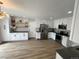 Spacious kitchen features stainless steel appliances, gray countertops, and white cabinets at 3575 S Ouray St, Aurora, CO 80013