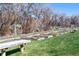 Community garden with individual plots available to residents, nestled in a beautiful grassy area with mature trees at 2437 E Geddes Pl, Centennial, CO 80122