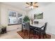 Well-lit dining room showcasing a view, stylish decor, and comfortable seating at 2437 E Geddes Pl, Centennial, CO 80122
