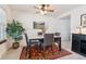 Cozy dining room features natural light, a modern table set, and elegant decor at 2437 E Geddes Pl, Centennial, CO 80122