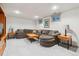 Spacious living room with comfortable seating, recessed lighting, and stylish decor at 2437 E Geddes Pl, Centennial, CO 80122