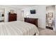 Cozy bedroom includes closet space and ensuite bathroom at 2437 E Geddes Pl, Centennial, CO 80122