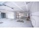 Unfinished basement with concrete floor and walls ready for customization at 5462 S Cedar St, Littleton, CO 80120
