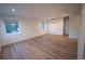 Spacious bedroom with hardwood floors, recessed lights, and multiple windows at 5462 S Cedar St, Littleton, CO 80120