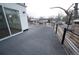 Wide view from the deck, featuring modern railings and an overlooking neighborhood and landscape at 5462 S Cedar St, Littleton, CO 80120