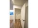 A dedicated laundry room with essential connections and modern flooring near a bright window for added convenience at 5462 S Cedar St, Littleton, CO 80120