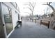View of large outdoor patio with grill, propane, and black metal railing at 5462 S Cedar St, Littleton, CO 80120