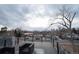 Spacious rooftop deck perfect for relaxing and entertaining with neighborhood views and stylish patio furniture at 5462 S Cedar St, Littleton, CO 80120