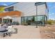 Modern coffee shop with outdoor seating and large windows, perfect for relaxing at 8409 Rush Creek Ave, Littleton, CO 80125
