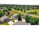 Aerial view featuring home and neighborhood with green spaces and mature trees at 9916 Sand Cherry Way, Highlands Ranch, CO 80129