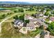 Aerial view showcasing the neighborhood, greenbelt, and recreational facilities at 9916 Sand Cherry Way, Highlands Ranch, CO 80129