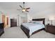 Primary bedroom with ample space, great natural light, and tasteful decor at 9916 Sand Cherry Way, Highlands Ranch, CO 80129