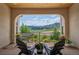 Inviting outdoor deck with chairs and stunning mountain view in the background at 15490 W Asbury Ave, Lakewood, CO 80228
