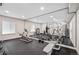 A well-equipped fitness center with a variety of machines and workout equipment at 15490 W Asbury Ave, Lakewood, CO 80228