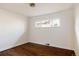 Bright bedroom featuring hardwood floors and a window at 3501 W 41St Ave, Denver, CO 80211