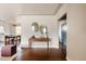 A bright foyer with hardwood floors, stylish console table, and a view of the dining area at 3501 W 41St Ave, Denver, CO 80211