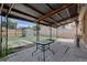 Backyard features a covered patio with decorative metal supports and a metal garden shed at 10900 Mildred Dr, Northglenn, CO 80233