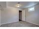 Basement with painted walls and tile flooring, plus a small window letting in natural light at 10900 Mildred Dr, Northglenn, CO 80233