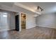 Finished basement provides room for storage and features an open doorway to another room at 10900 Mildred Dr, Northglenn, CO 80233