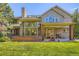 Spacious backyard featuring a covered patio ideal for entertaining at 9096 E Colorado Cir, Denver, CO 80231