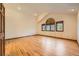Spacious bedroom features vaulted ceilings, hardwood floors, and recessed lighting at 9096 E Colorado Cir, Denver, CO 80231