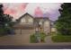 Beautiful two-story home with a three-car garage, arched windows, and a well-manicured lawn at 9096 E Colorado Cir, Denver, CO 80231