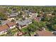 Aerial view of the house with a large backyard and tree coverage in a Gathering neighborhood at 10832 W Powers Pl, Littleton, CO 80127