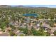 Aerial view of neighborhood and houses in the area with a mountain view in the distance at 10832 W Powers Pl, Littleton, CO 80127
