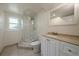 Bathroom with step-in shower, vanity, and neutral tones at 10832 W Powers Pl, Littleton, CO 80127