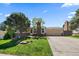 Well-kept residence boasting a lush green yard, an attached two-car garage, and an inviting front porch at 10832 W Powers Pl, Littleton, CO 80127