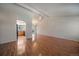 Spacious living room with wood floors and lots of natural light at 10832 W Powers Pl, Littleton, CO 80127