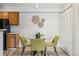 Charming dining area with modern lighting and storage at 205 Wright St # 104, Lakewood, CO 80228