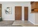 View of doors, walls, and artwork from living room at 205 Wright St # 104, Lakewood, CO 80228