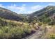 Picturesque nature trail meandering through lush hills, inviting exploration and outdoor adventures at 205 Wright St # 104, Lakewood, CO 80228