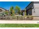Fenced backyard with lush landscaping, offering privacy and a serene outdoor space at 110 Ferris Ln, Erie, CO 80516
