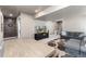 Large finished basement with a living area and game space at 110 Ferris Ln, Erie, CO 80516