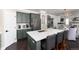 Updated kitchen with stainless steel appliances, white countertops, and painted cabinets at 110 Ferris Ln, Erie, CO 80516