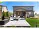 Relaxing covered patio with outdoor seating, perfect for entertaining or enjoying the backyard at 110 Ferris Ln, Erie, CO 80516