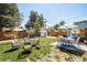 Large backyard with patio, lawn, and a shed at 1800 S Tennyson St, Denver, CO 80219