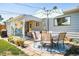 Outdoor dining area and relaxing patio furniture in the backyard at 1800 S Tennyson St, Denver, CO 80219