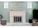 White brick fireplace with decorative accents at 1800 S Tennyson St, Denver, CO 80219