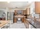 Modern kitchen with stainless steel appliances at 1800 S Tennyson St, Denver, CO 80219