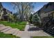 Well-maintained community with green spaces, mature trees, and attractive architecture at 8060 W 9Th Ave # 204, Lakewood, CO 80214