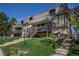 Charming multi-level townhomes featuring well-maintained lawns, and inviting entrances at 8060 W 9Th Ave # 204, Lakewood, CO 80214