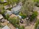 An aerial view of the house showing the roof, yard, and surrounding street at 701 W Quincy Ave, Englewood, CO 80110