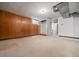 Basement area with carpet, access to closet, and unfinished bathroom at 701 W Quincy Ave, Englewood, CO 80110