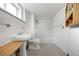 White bathroom featuring a combination shower and tub at 701 W Quincy Ave, Englewood, CO 80110