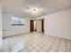 Finished basement space with tiled floor and egress window at 1720 S Ammons St # A, Lakewood, CO 80232