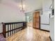 Eat in kitchen featuring a dining area, balcony, and white appliances at 1720 S Ammons St # A, Lakewood, CO 80232